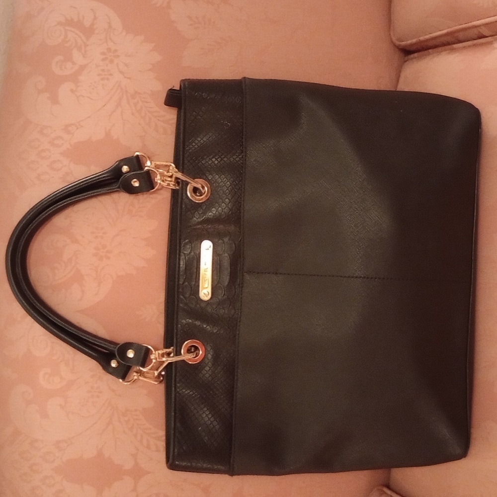 VGUC. Michael kors black tote with gold tone hardware.